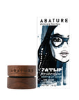 Wooden lip balm container and packaging with 'ABATURE' branding on a white background