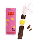 Antidote Rose Salt and Lemon Peel 77% dark chocolate bar in pink wrapping with a broken bar