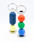 Colorful bottle openers on a white background.