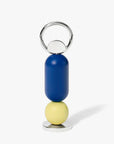 Areaware Abaco bottle opener in blue, yellow on a white background.