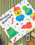 Shape stamps set with colorful stamps on a striped background