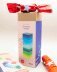 Block Design Gradient Tower box beside the Gradient Dominoes box with a red ribbon