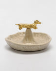 CÂPÂ speckled ceramic jewelry dish topped with a gold-plated dachshund