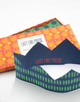 East End Press paper crowns box with a navy and green crown in front