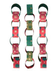 Three linked paper chains in red, green and gold star and sunburst patterns