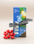 Figa 63% cupuacu bar in a blue illustrated wrapper, tied with a striped ribbon