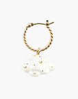 Daydreamer twisted gold hoop with a white porcelain cloud charm and painted gold stars