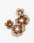 Burgundy Patricia Nicolas floral drop earrings with gold accents on a white background