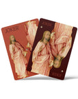 Two joker cards from the Hieronymus Bosch deck with robed figures in coral and burgundy