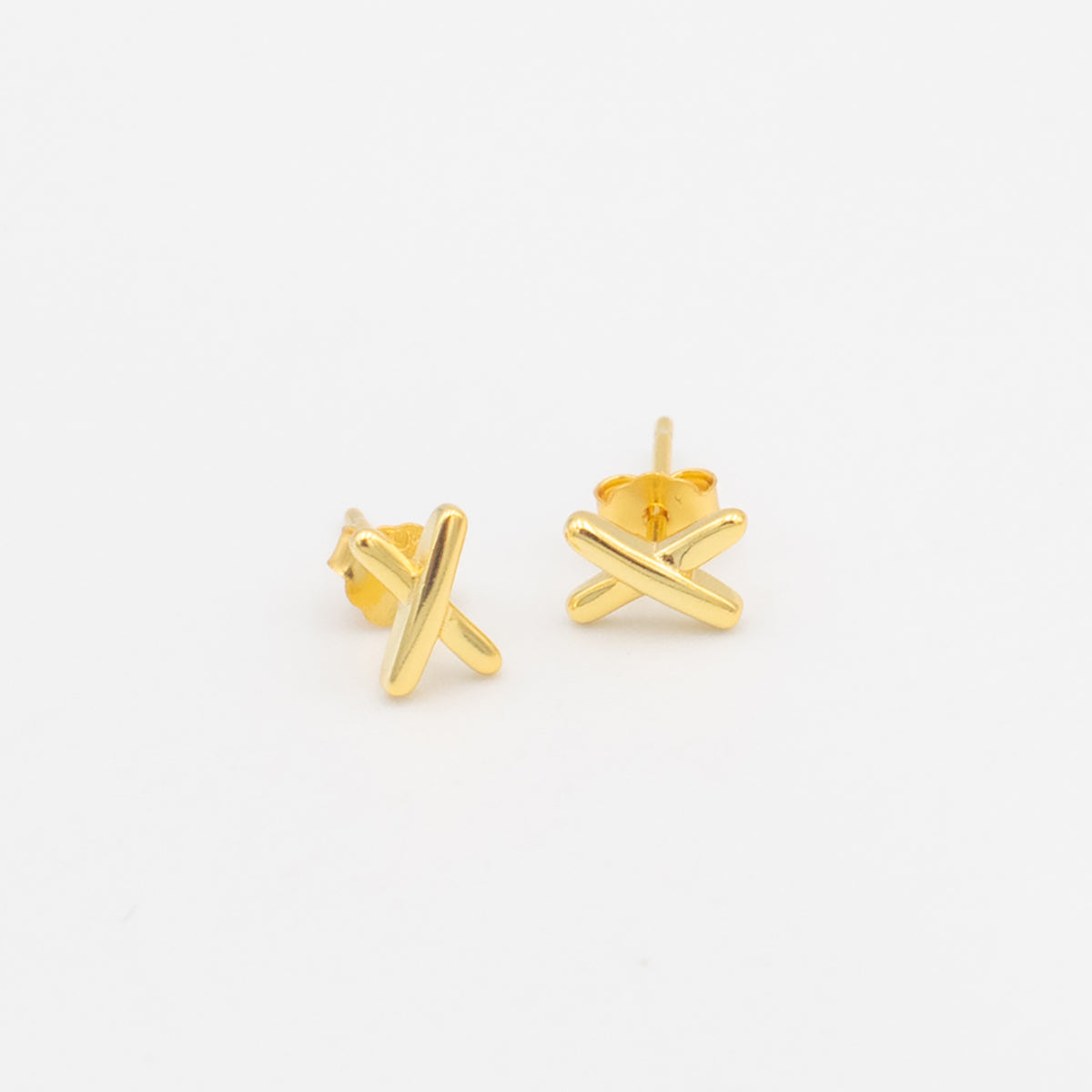 dainty 'X' gold stud earrings