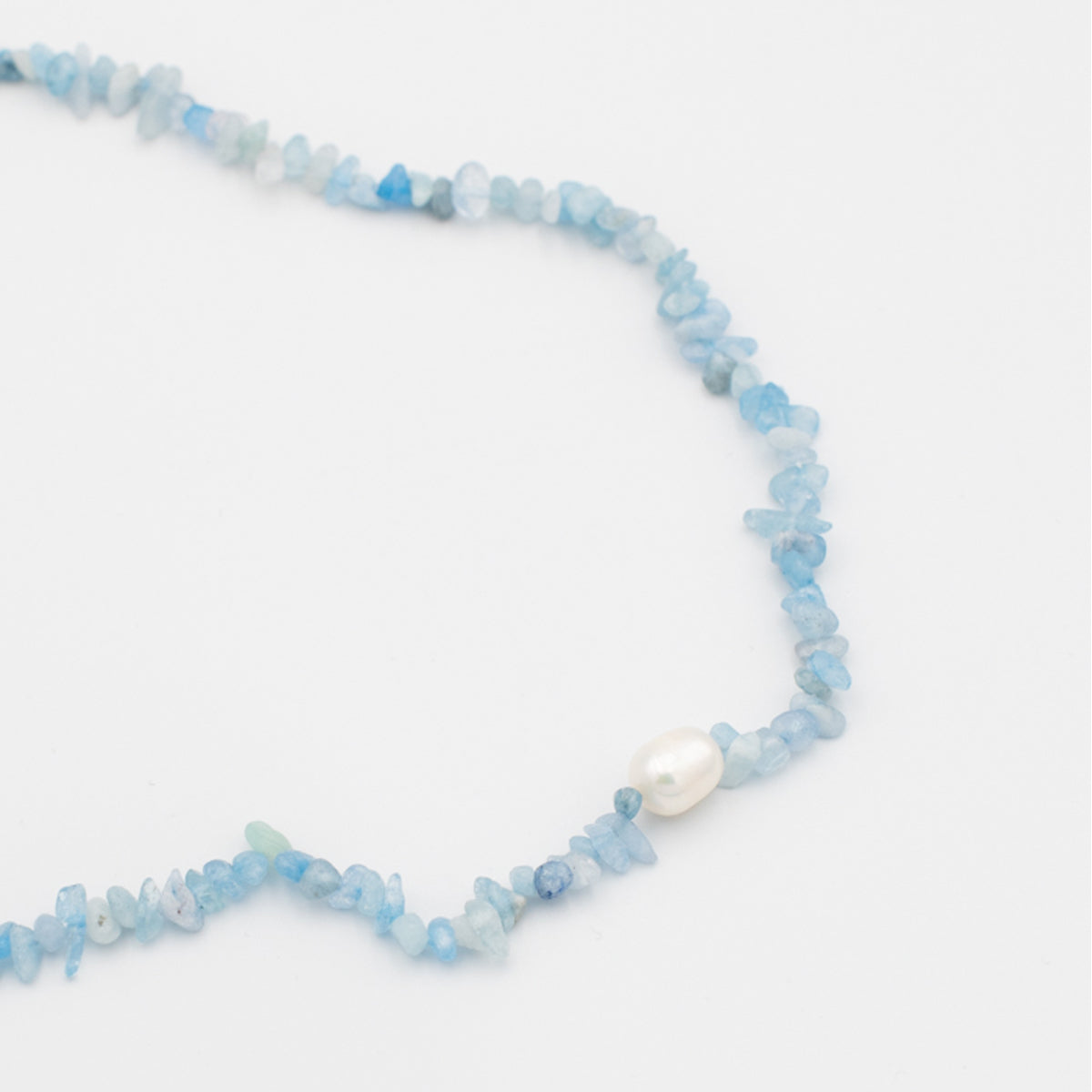 blue resin puka necklace with pearl