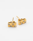 Raising Surfers gold bar stud earrings with alternating squares of gold and sparkly stones on a white background.