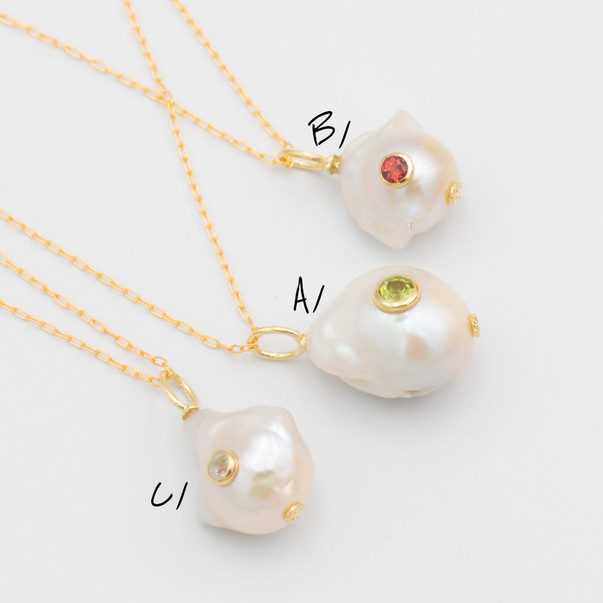 Baroque Pearl Pendant With Set-In Gemstone