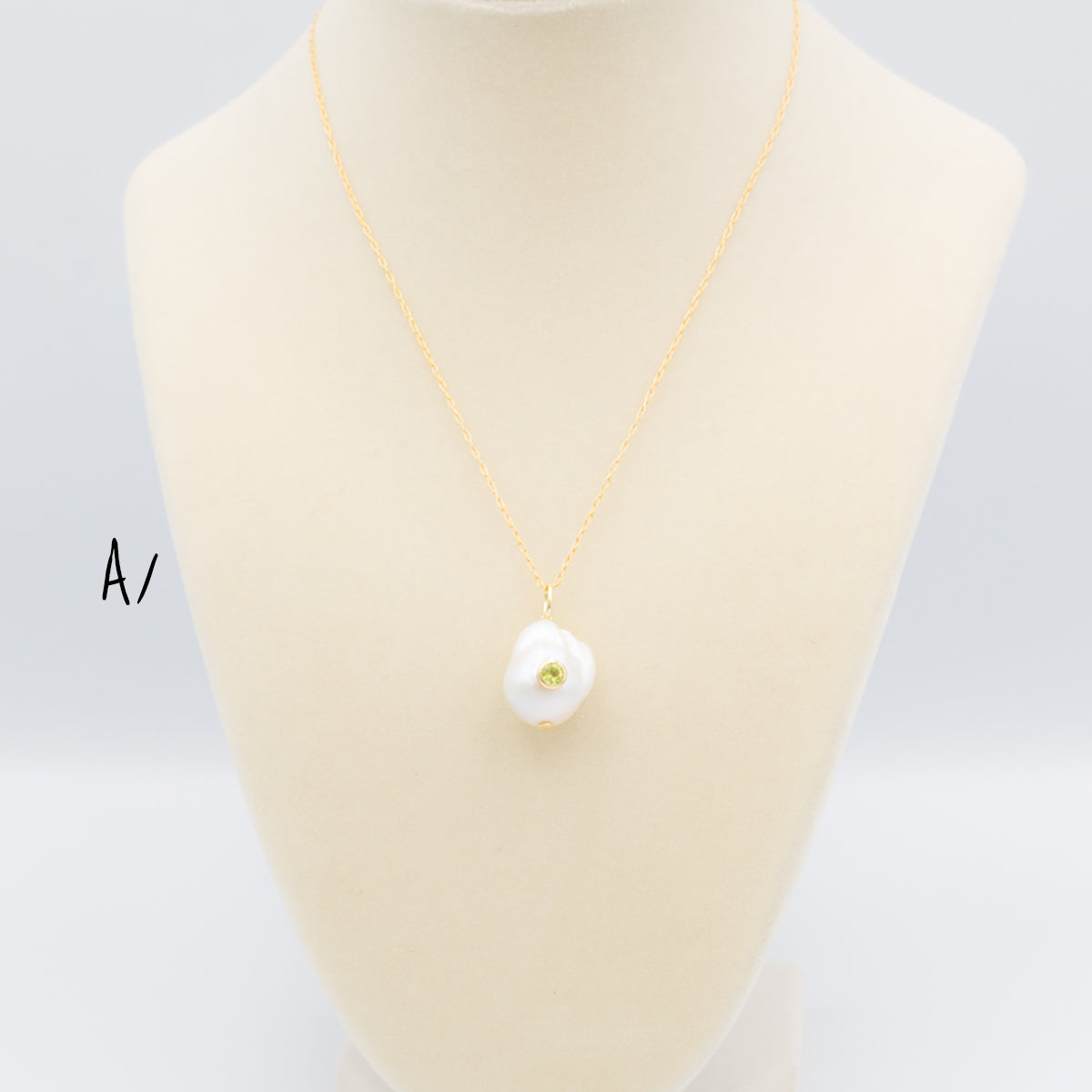 Baroque Pearl Pendant With Set-In Gemstone