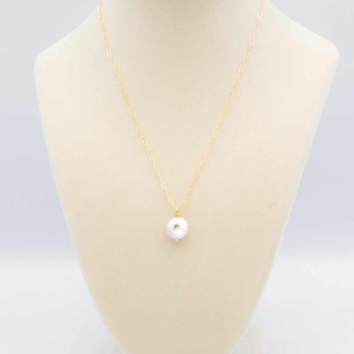 Pearl Pendant With Set-In Gemstone