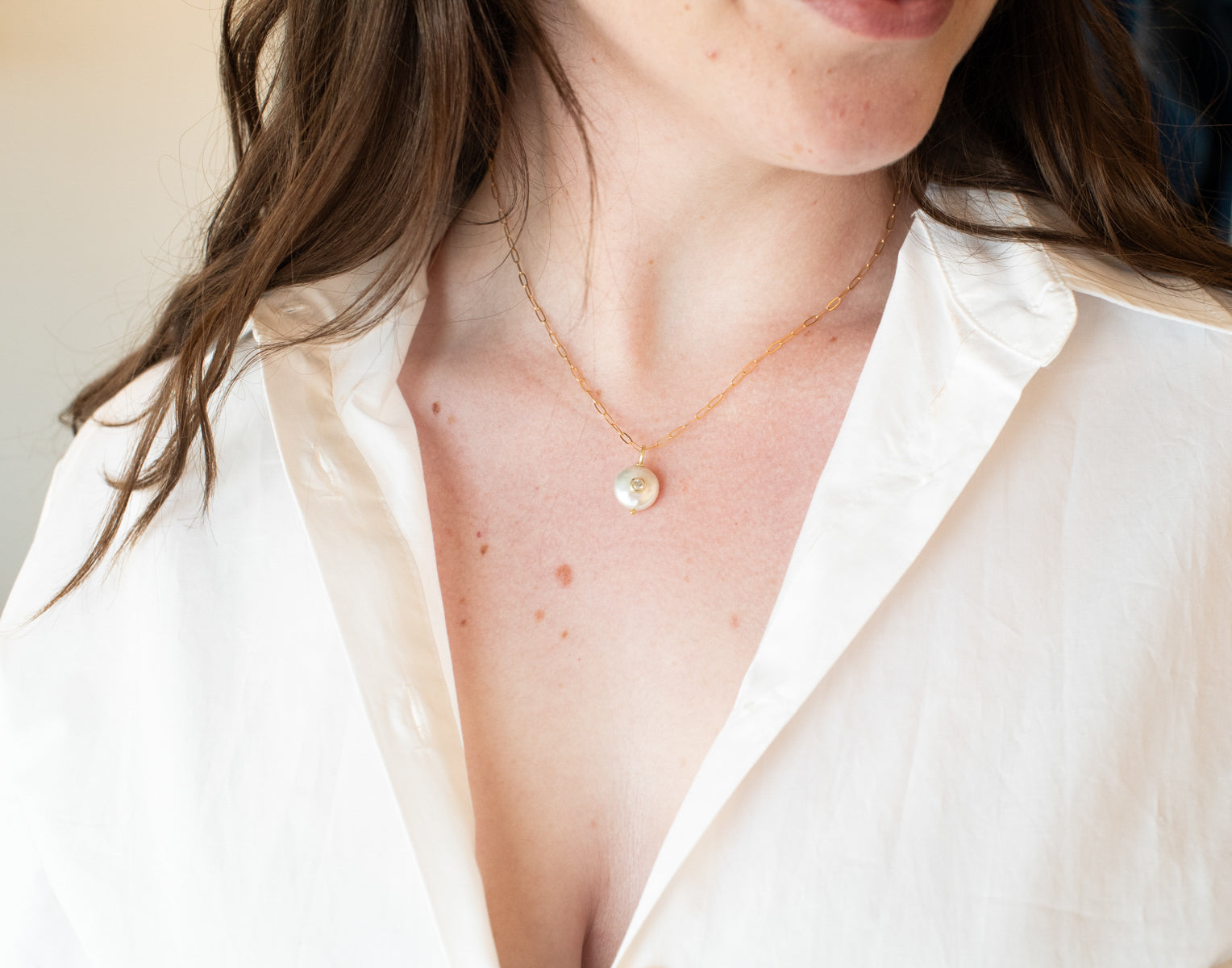 Pearl Pendant With Set-In Gemstone