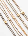 Close up of antique gold-fill Chatelaine necklaces with authentic late-Victorian lorgnette chains & pearls.