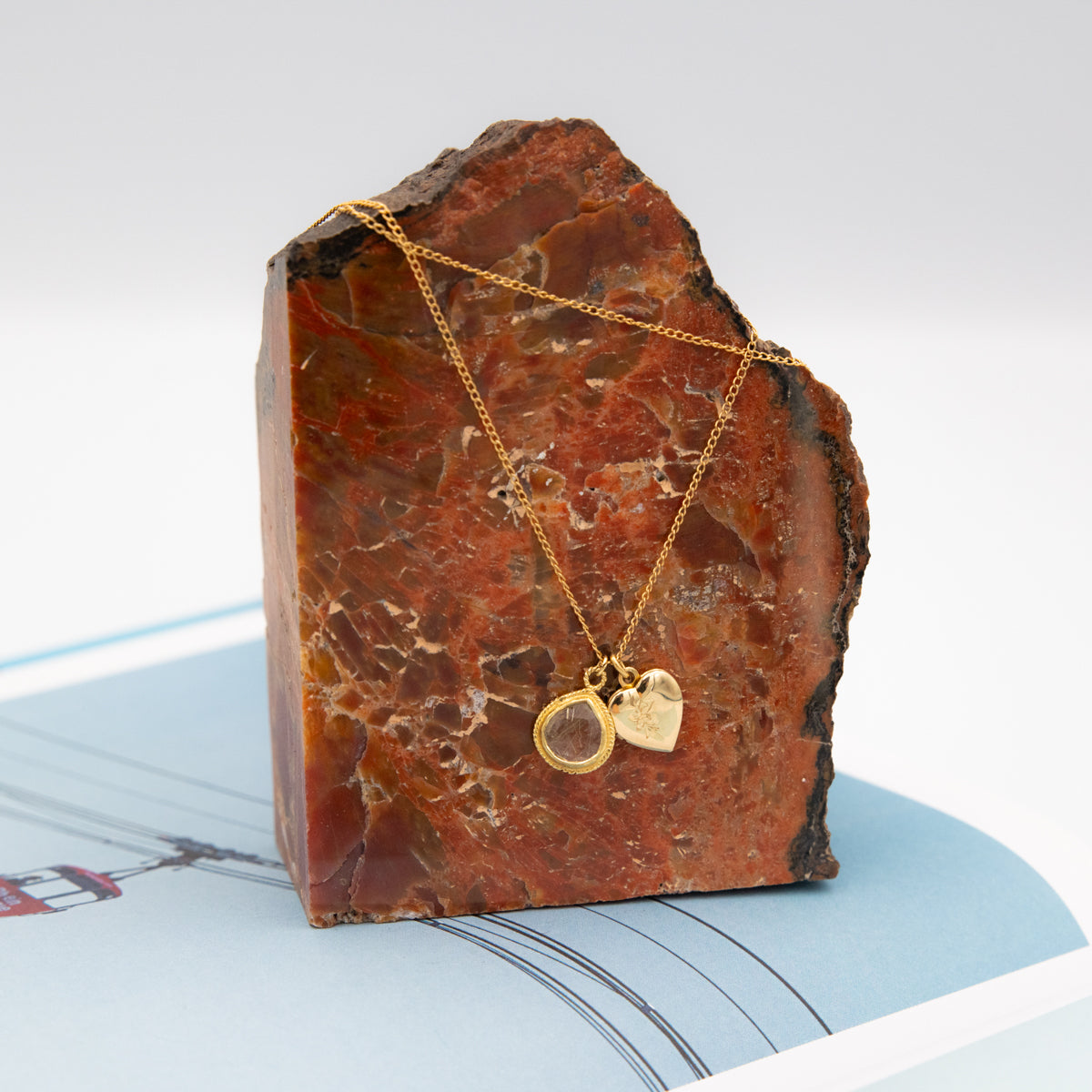 Gold Locket With Charm