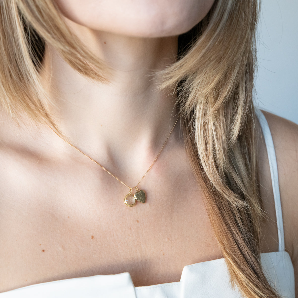 Gold Locket With Charm