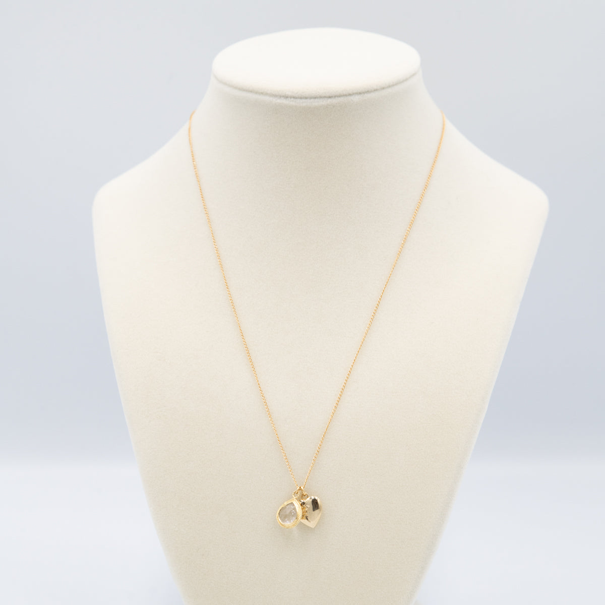 Gold Locket With Charm