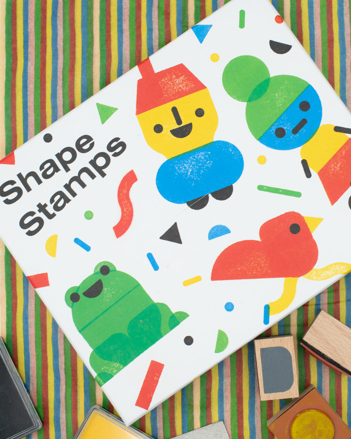 Shape stamps set with colorful stamps on a striped background