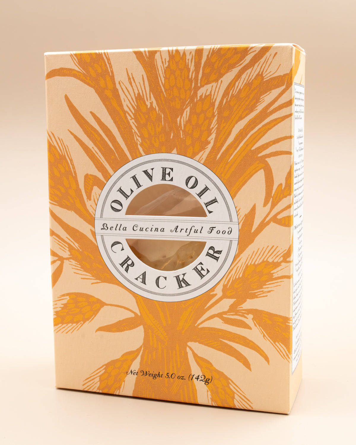 Front of the Bella Cucina Olive Oil Cracker box with an orange wheat illustration