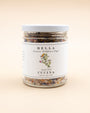 Jar of Bella Cucina Aromatic Wildflower Sugar with a botanical label