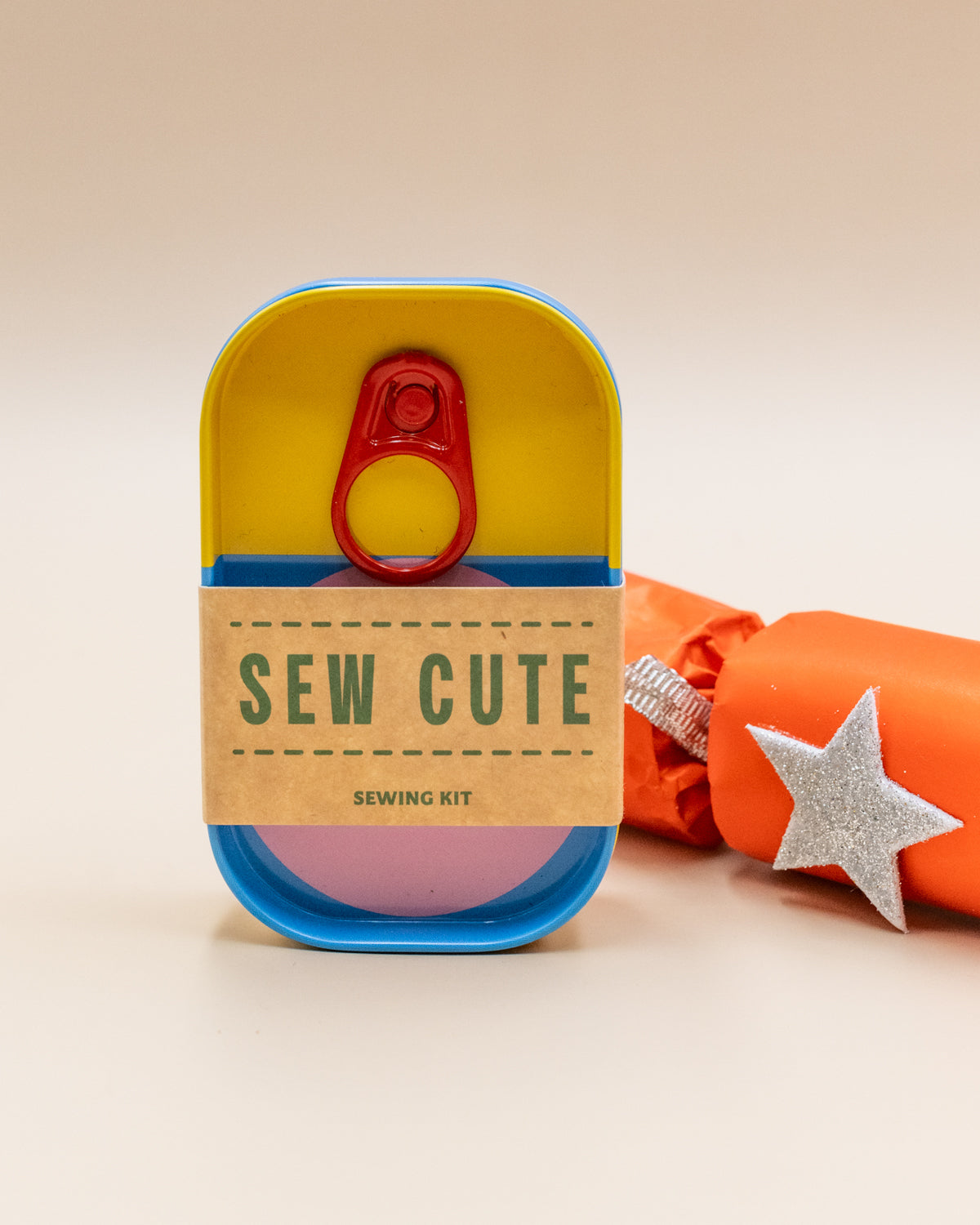 Block Design Sew Cute sewing kit tin in yellow and blue with a red pull tab and kraft sleeve