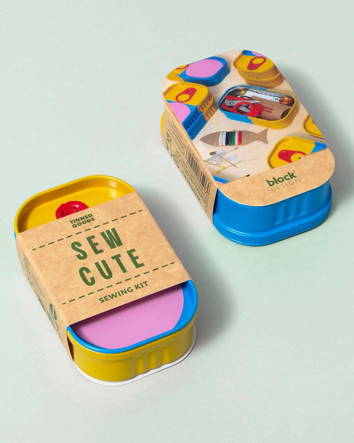 Block Design Sew Cute sewing kit tin in its kraft sleeve, stacked on a second tin