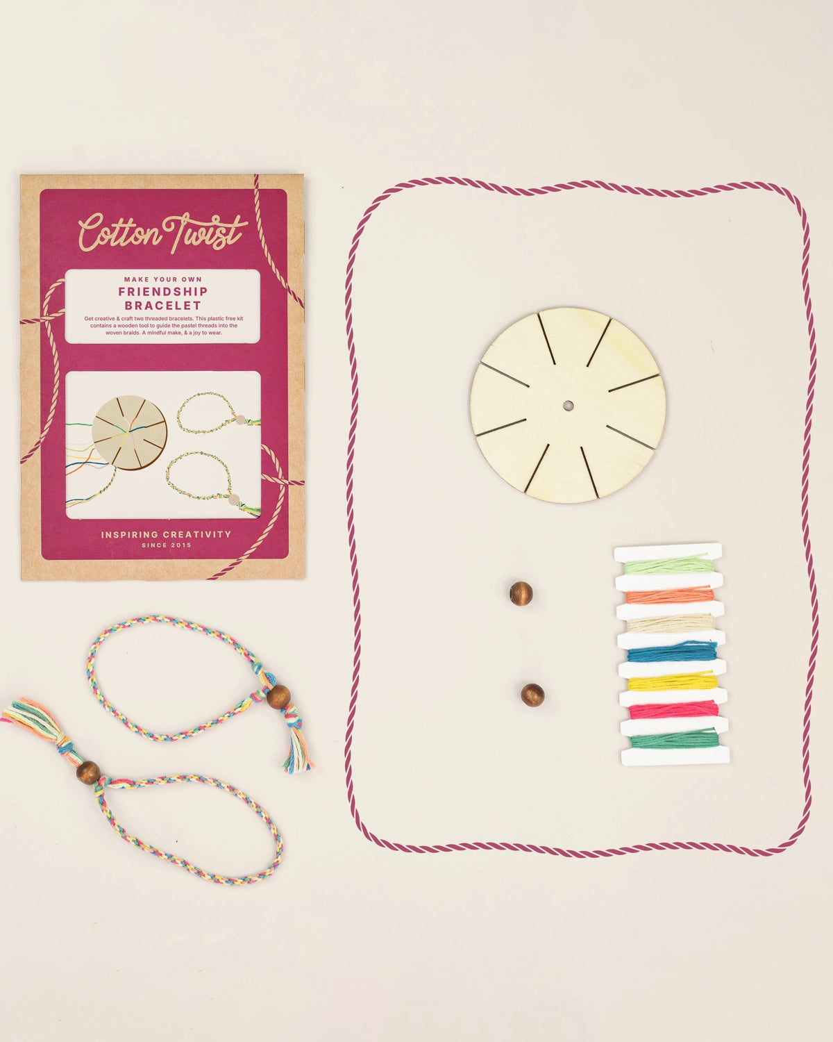 Cotton Twist friendship bracelet kit contents: wooden weaving disc, beads, colored thread and a finished bracelet
