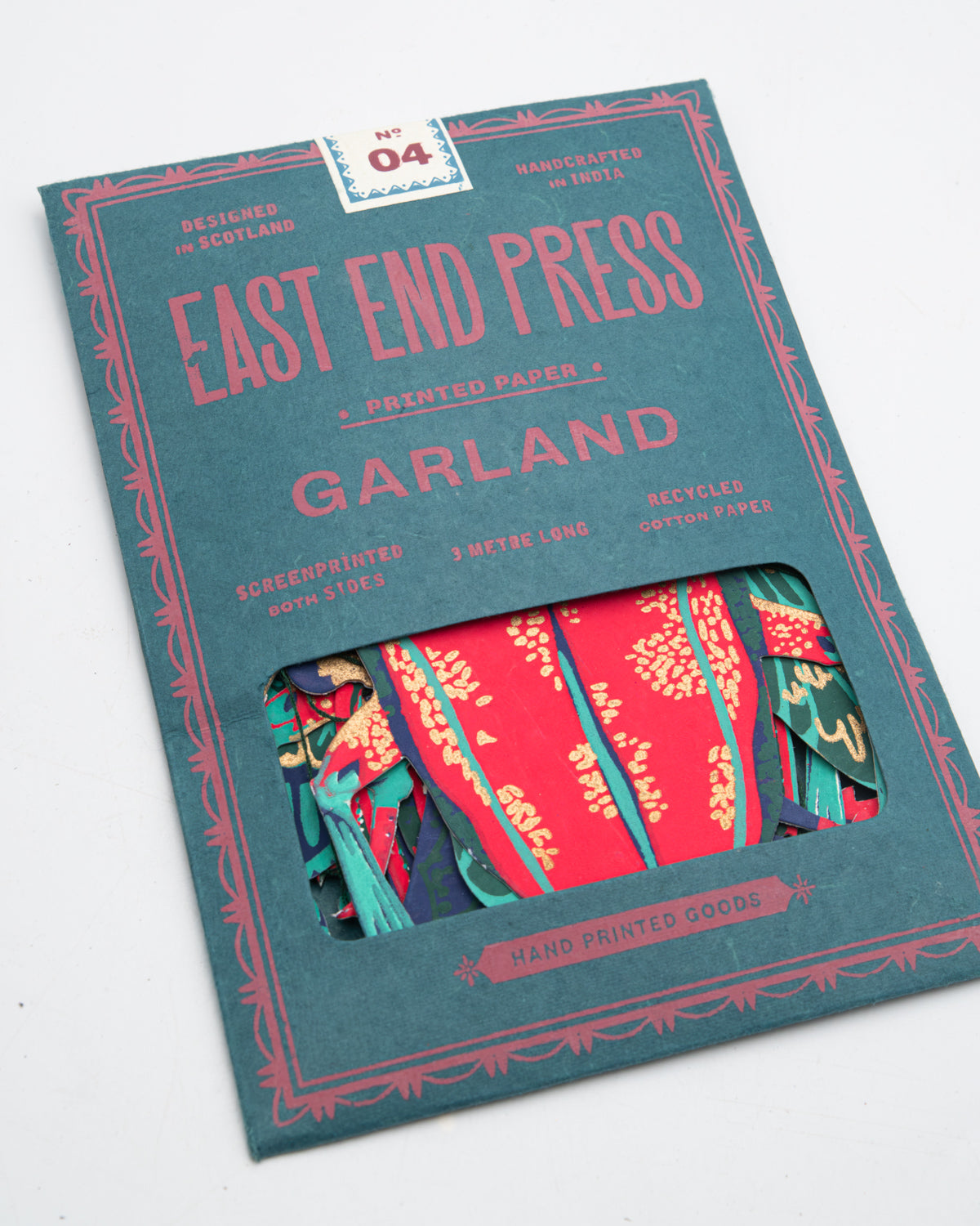 East End Press insect garland in its teal and red paper packet