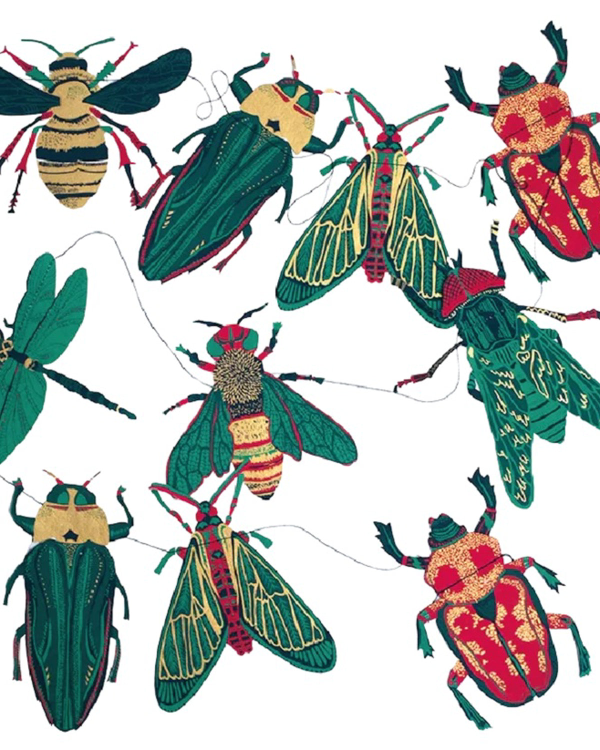 Hand-printed paper beetles, bees, moths and a dragonfly from the garland, laid out on white