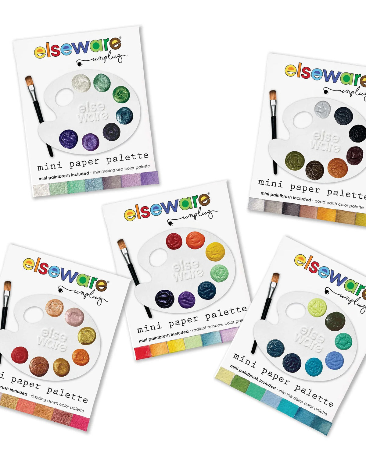 Five Elseware mini paper watercolor palettes in different color sets, scattered on white