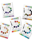 Five Elseware mini paper watercolor palettes in different color sets, scattered on white
