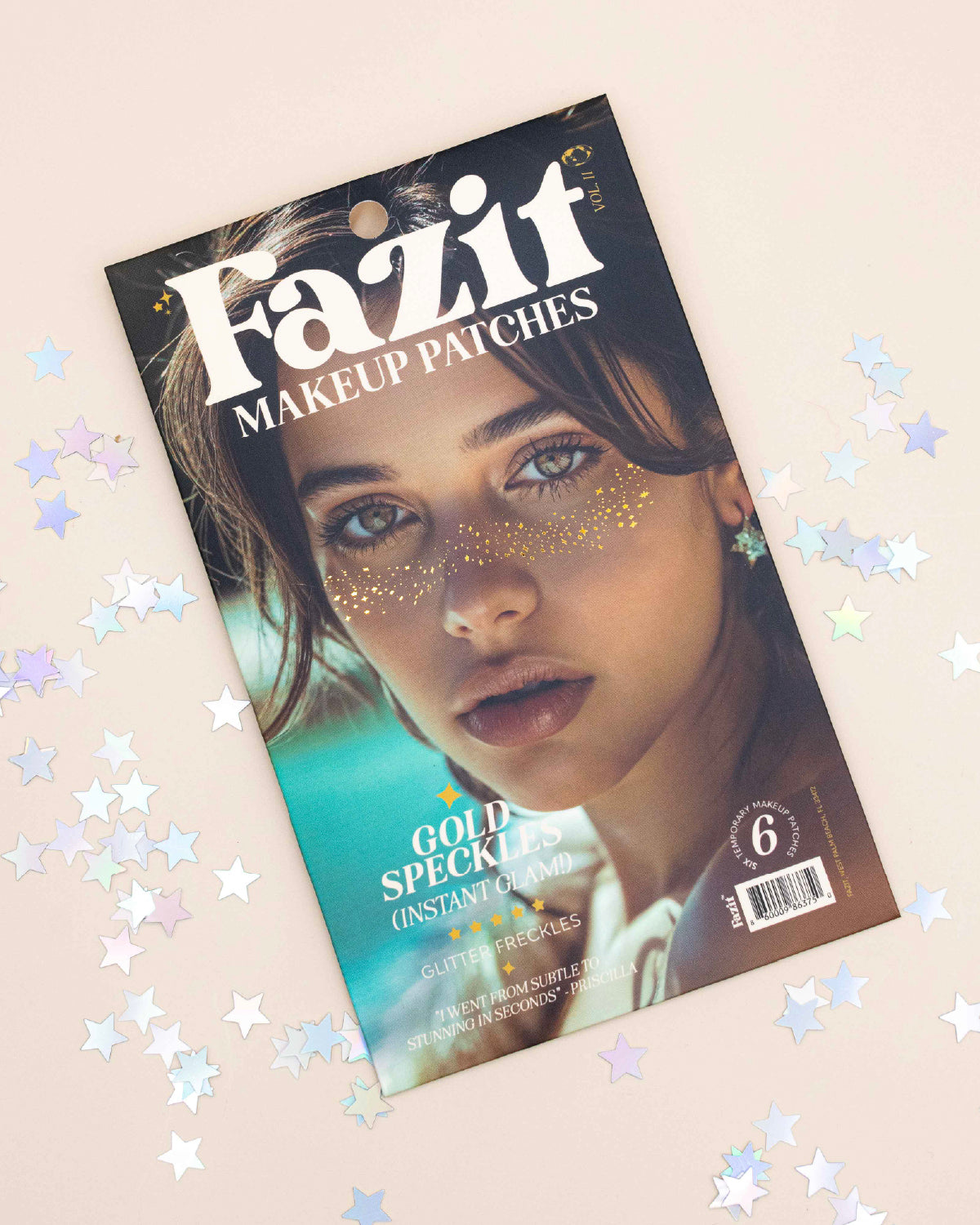 Fazit Gold Speckles makeup patches package with a model's glittery freckles on the cover