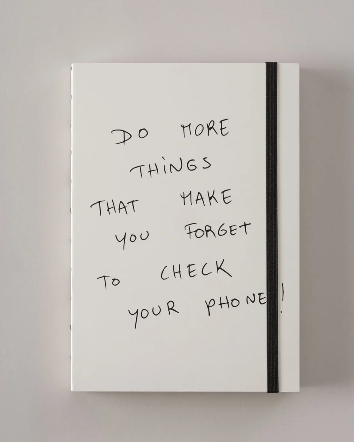 White Poète notebook with the cover quote Do more things that make you forget to check your phone