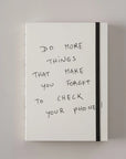 White Poète notebook with the cover quote Do more things that make you forget to check your phone