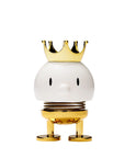 White Hoptimist Prince figure with a gold crown and gold spring legs