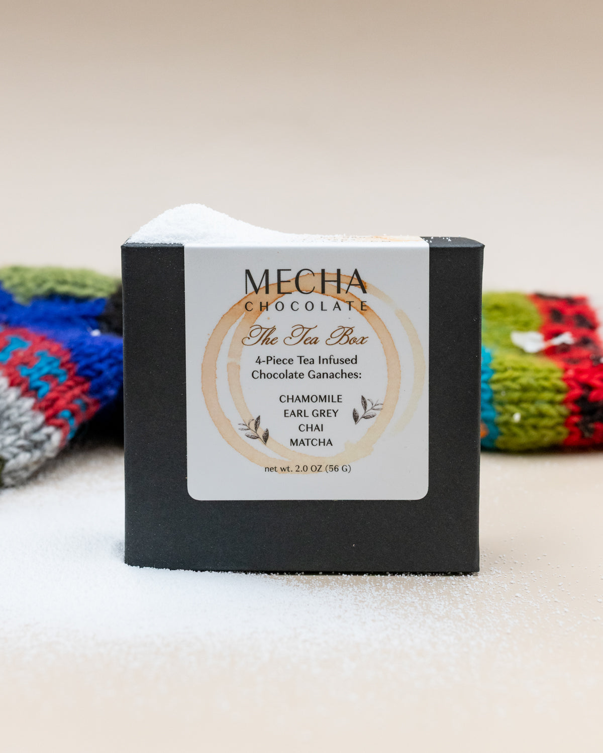 MECHA Chocolate Tea Box of four tea-infused ganaches in its black box with a cream label