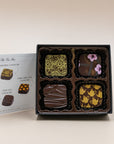 Four MECHA tea ganaches, chai, chamomile, Earl Grey and matcha, beside the flavor card