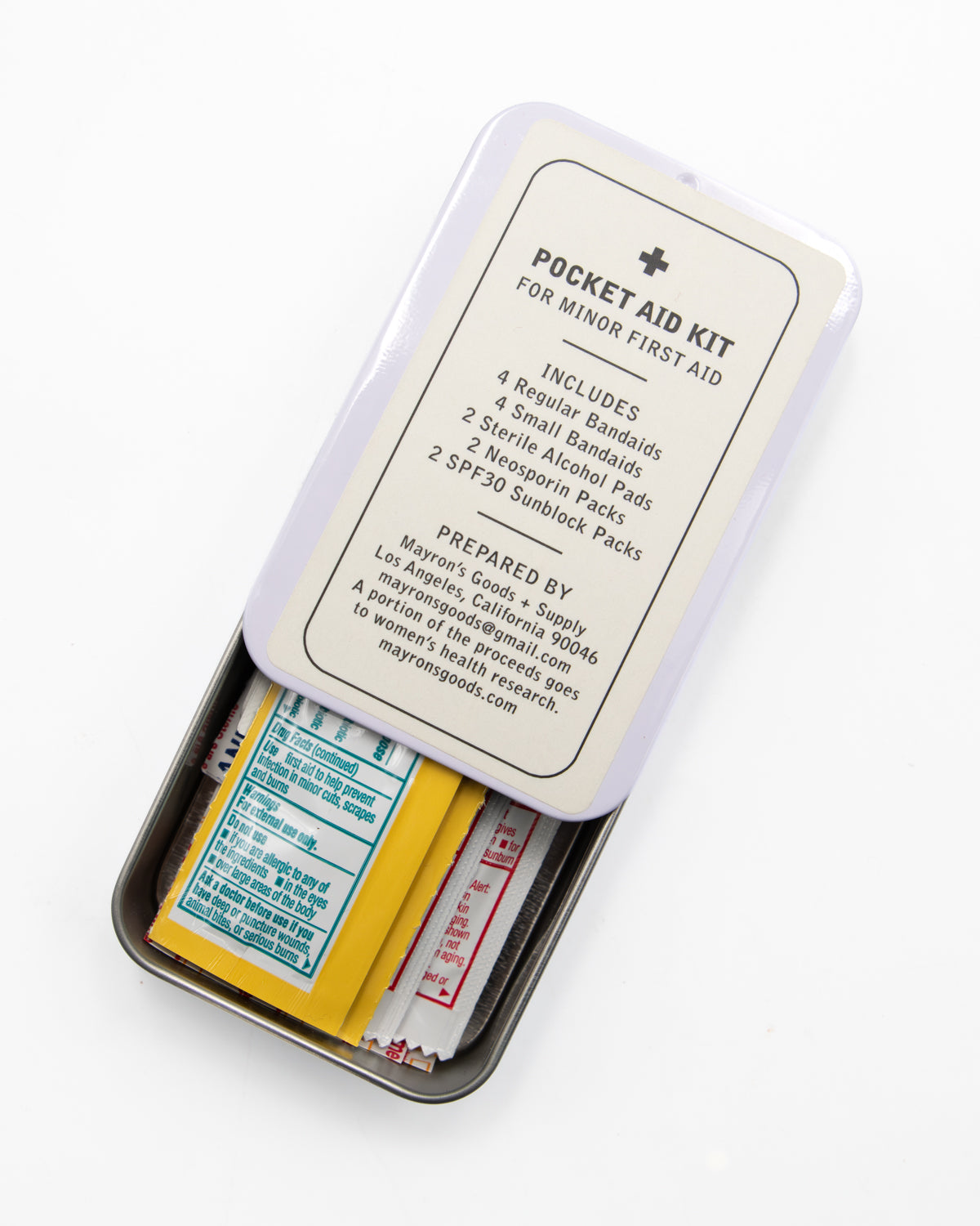 Pocket Aid Kit tin with its lid slid partly open to show the first aid packets