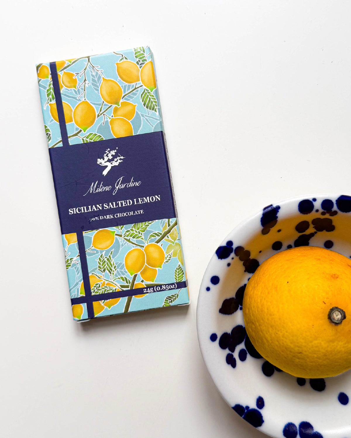 Milene Jardine Sicilian Salted Lemon 70% dark chocolate bar in lemon-print wrapping