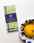 Milene Jardine Sicilian Salted Lemon 70% dark chocolate bar in lemon-print wrapping