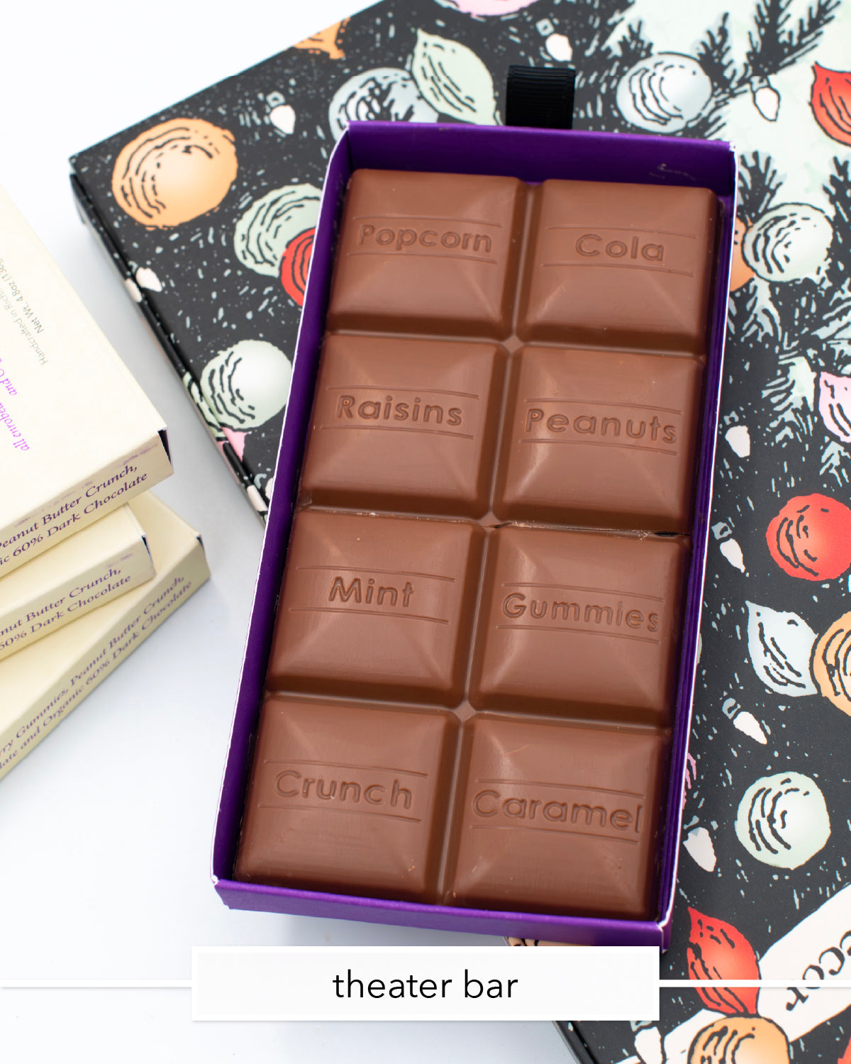Miss Maude's Theater Bar open in a purple box with squares like Popcorn and Mint