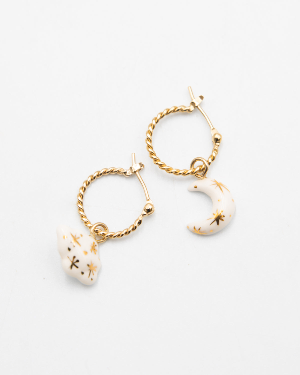 Nach Bijoux Daydreamer twisted gold mini hoops with white porcelain cloud and moon charms