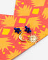 Nach Bijoux asymmetric earrings, a moon and a sun, with blue porcelain flower studs