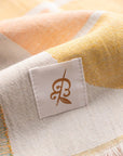 Close-up of a Turkish towel with a brand label