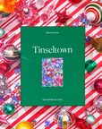 Tinseltown puzzle box from Piecework on red and white stripes with ornaments
