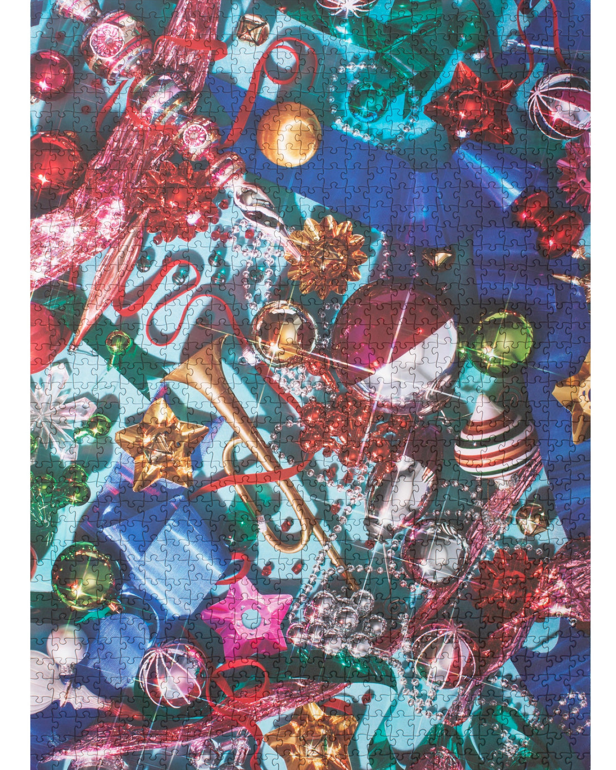 Finished Tinseltown puzzle image of colorful ornaments, tinsel and holiday baubles