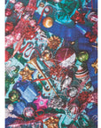 Finished Tinseltown puzzle image of colorful ornaments, tinsel and holiday baubles